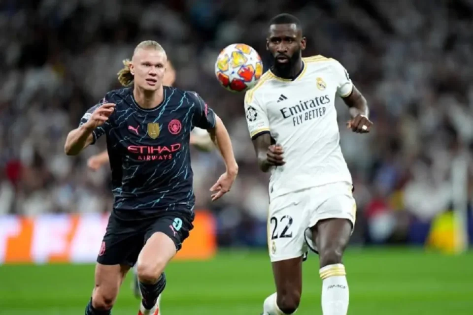 روديغير وهالاند لاعبا ريال مدريد ومانشستر سيتي